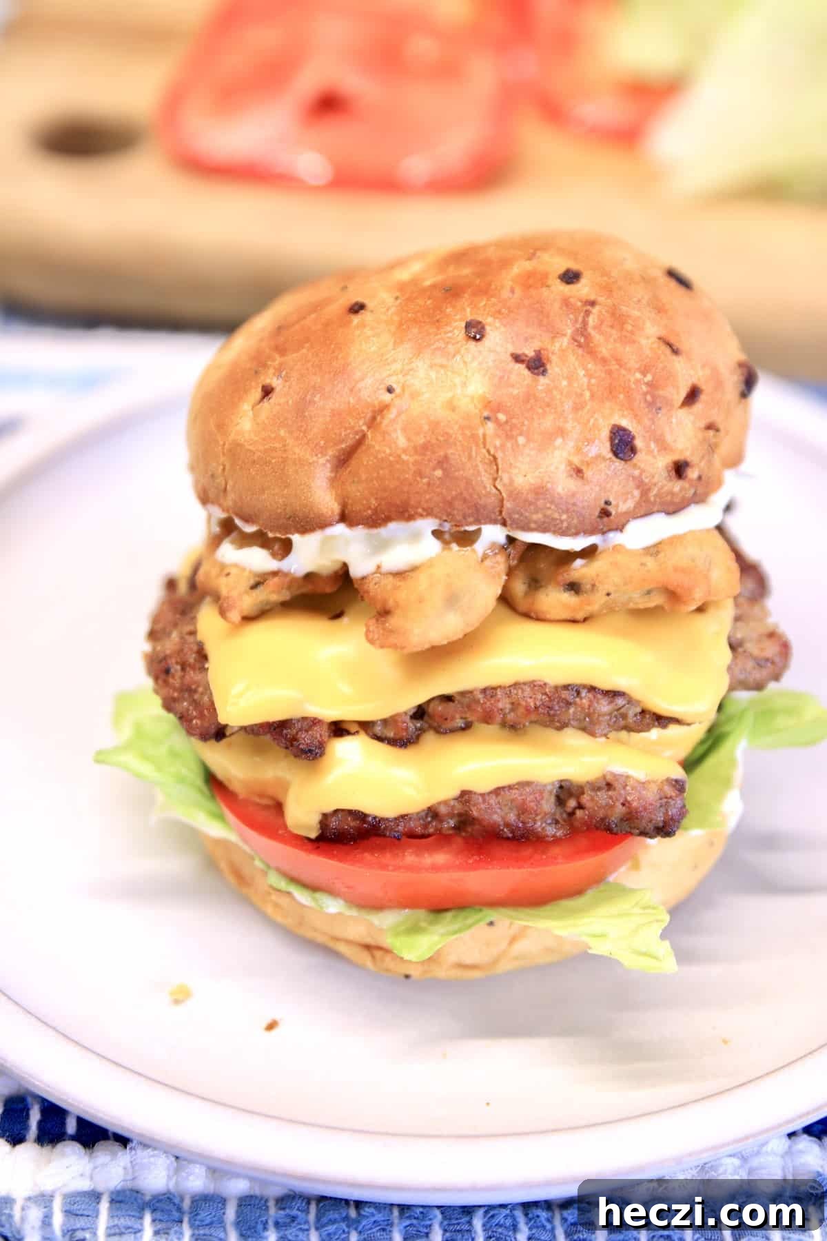 Onion bun double cheeseburger with fried pickles.
