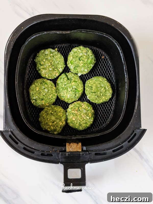 Hara Bhara Kabab Recipe — Tawa and Air Fryer Methods 8 hara bhara kabab kept in air fryer basket
