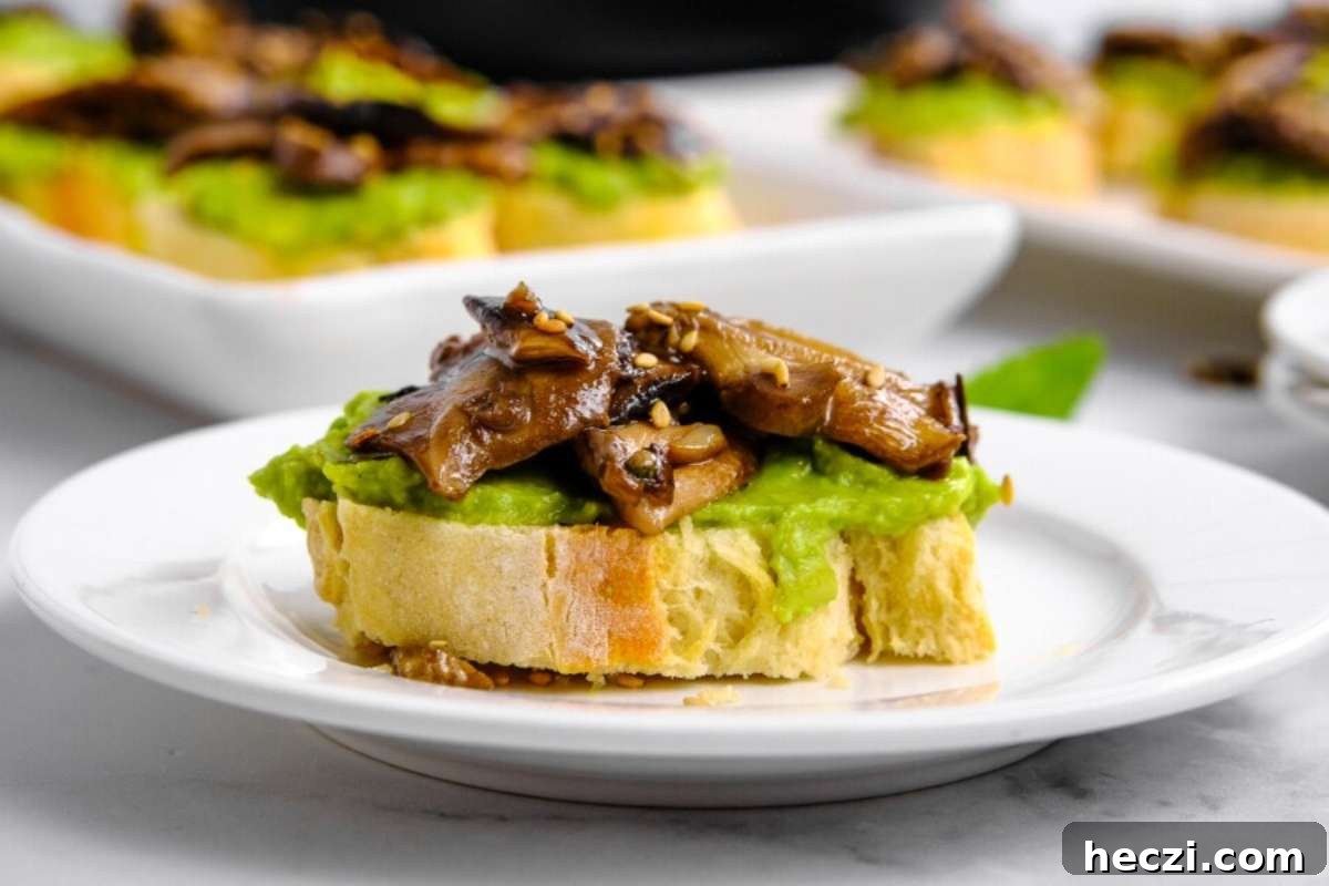 Italian appetizers featuring a plate of bruschetta with mushrooms and guacamole.