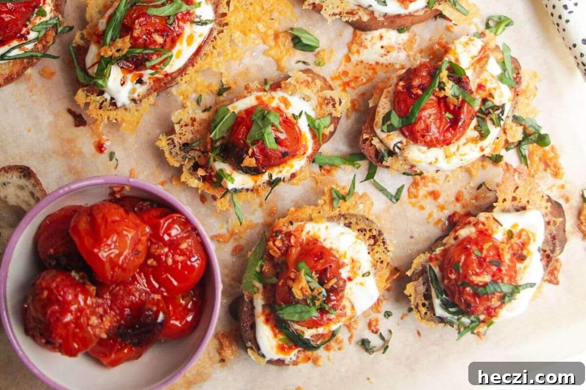Italian appetizers - A tray of bruschetta with tomatoes and cheese.