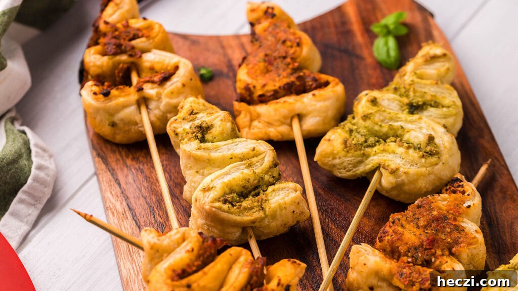Food blogger, Bella Bucchiotti of xoxoBella, shares a recipe for a pesto puff pastry Christmas tree appetizer. Add this puff pastry recipe to your list of Christmas appetizers!
