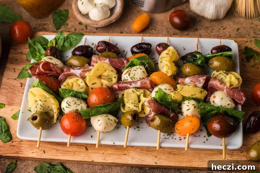 Antipasto appetizer on skewers.