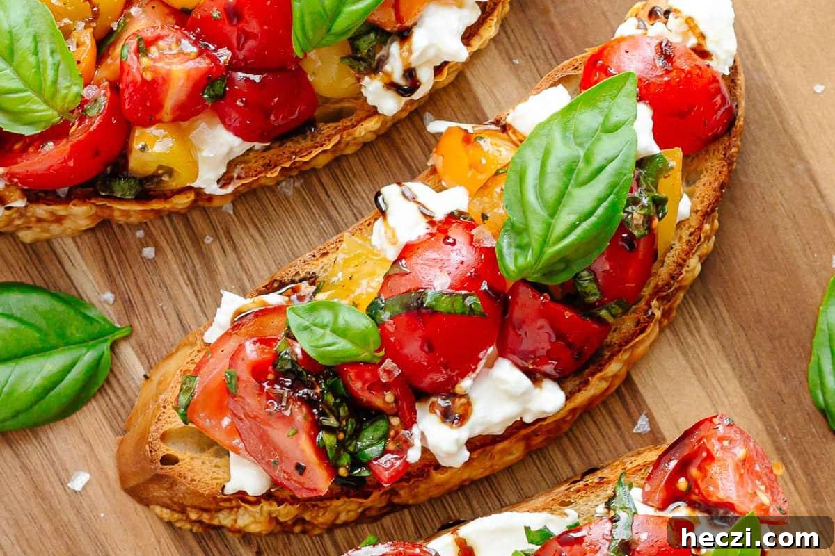 Grilled bruschetta with tomatoes and basil on a wooden cutting board