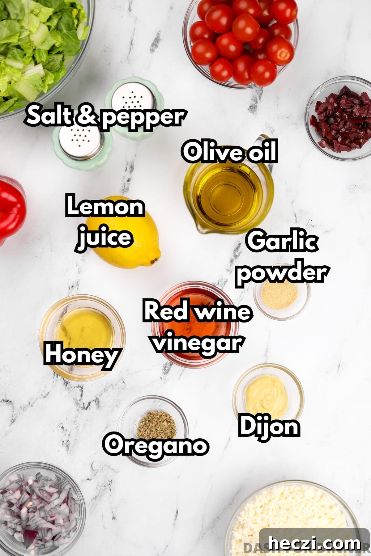 Authentic Greek Vinaigrette Recipe for Salads and Marinades 3 The ingredients needed to make greek dressing, including olive oil, red wine vinegar, honey, and oregano.