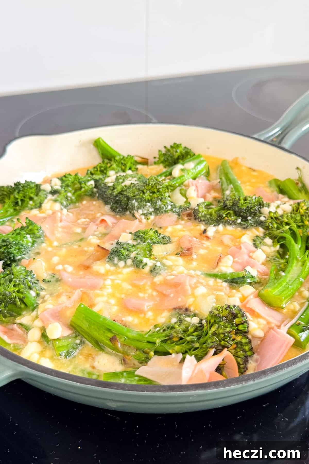Ham and Broccolini Frittata Recipe for Brunch or Dinner 9 Egg mixture poured in pan.
