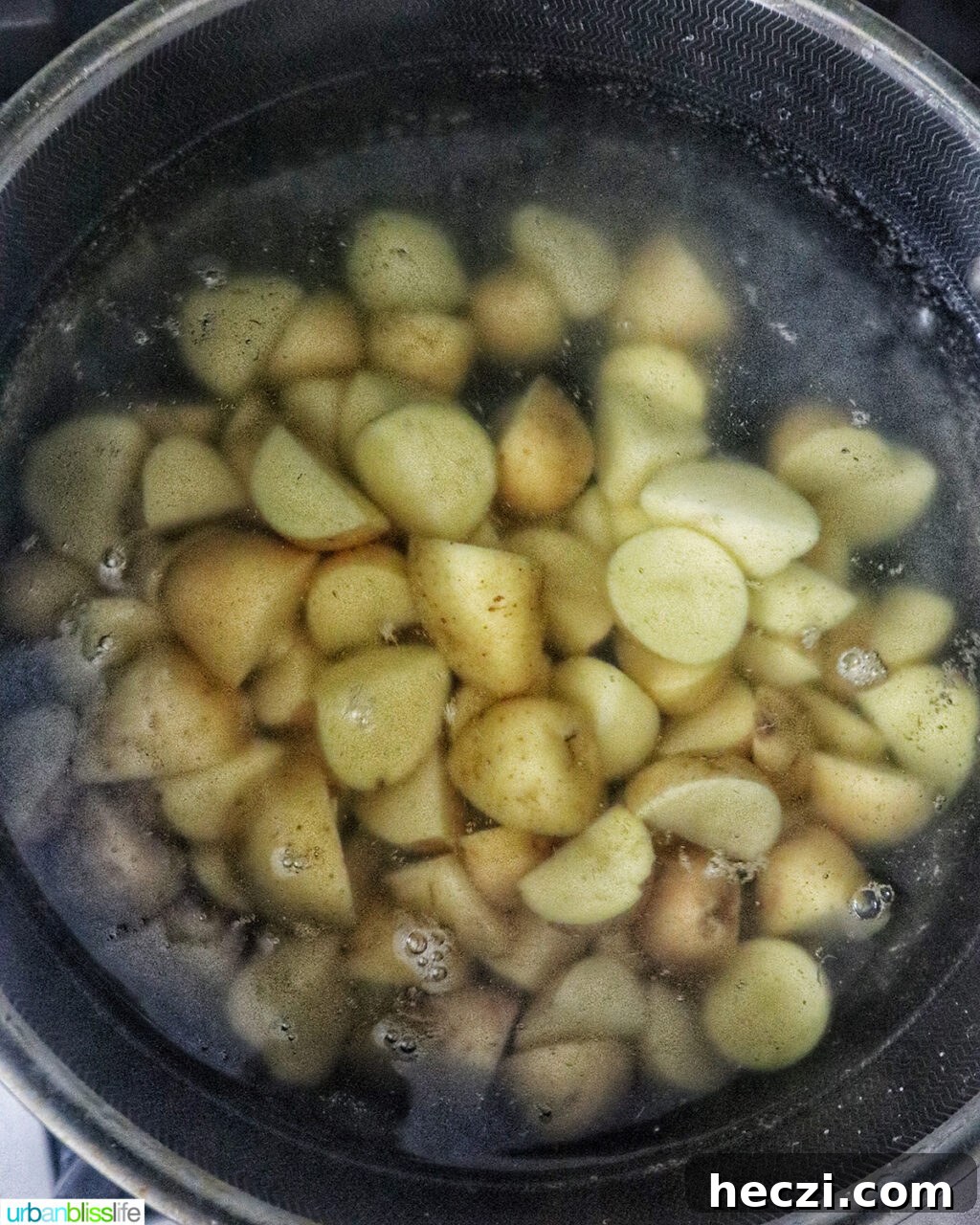 Creamy Dill Pickle Potato Salad Recipe 6 yukon gold potatoes boiling in water.