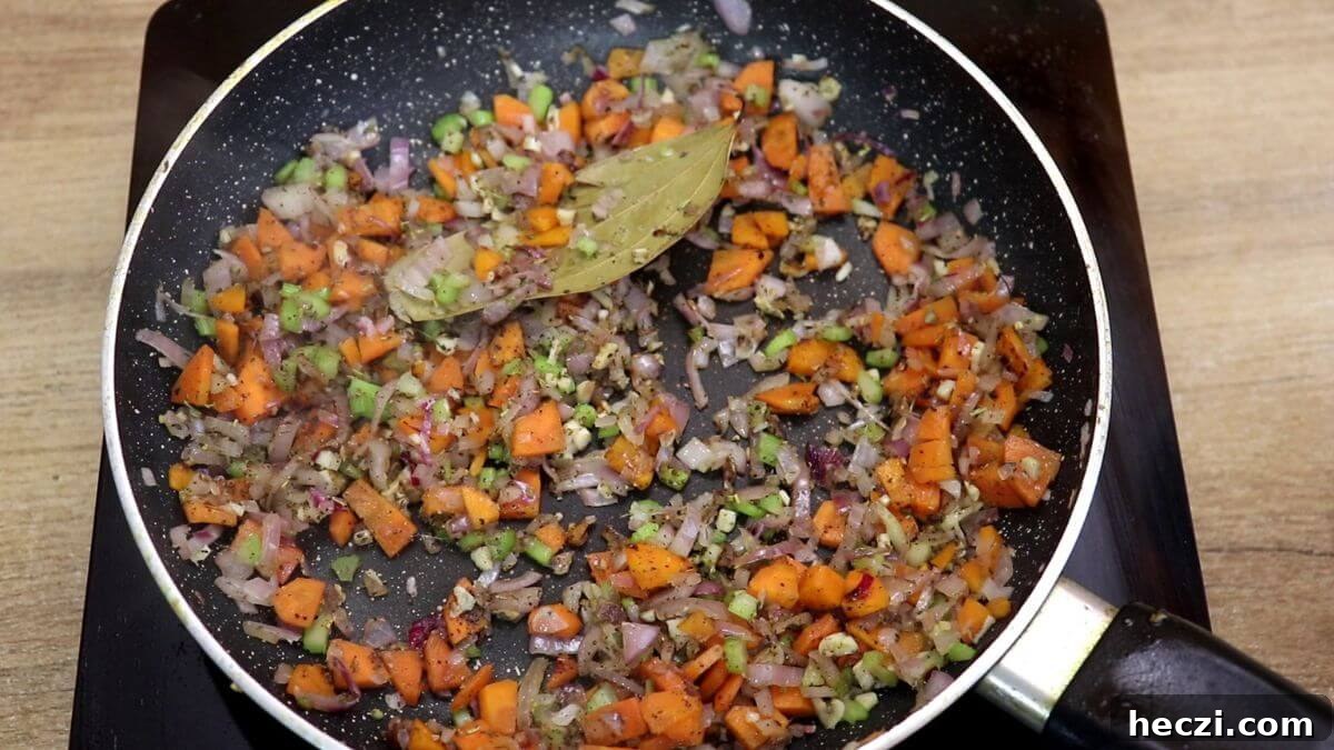 Creamy Chicken and Vegetable Stew for Comforting Weeknight Meals 8 seasoning the vegetables to make creamy vegetable chicken stew.