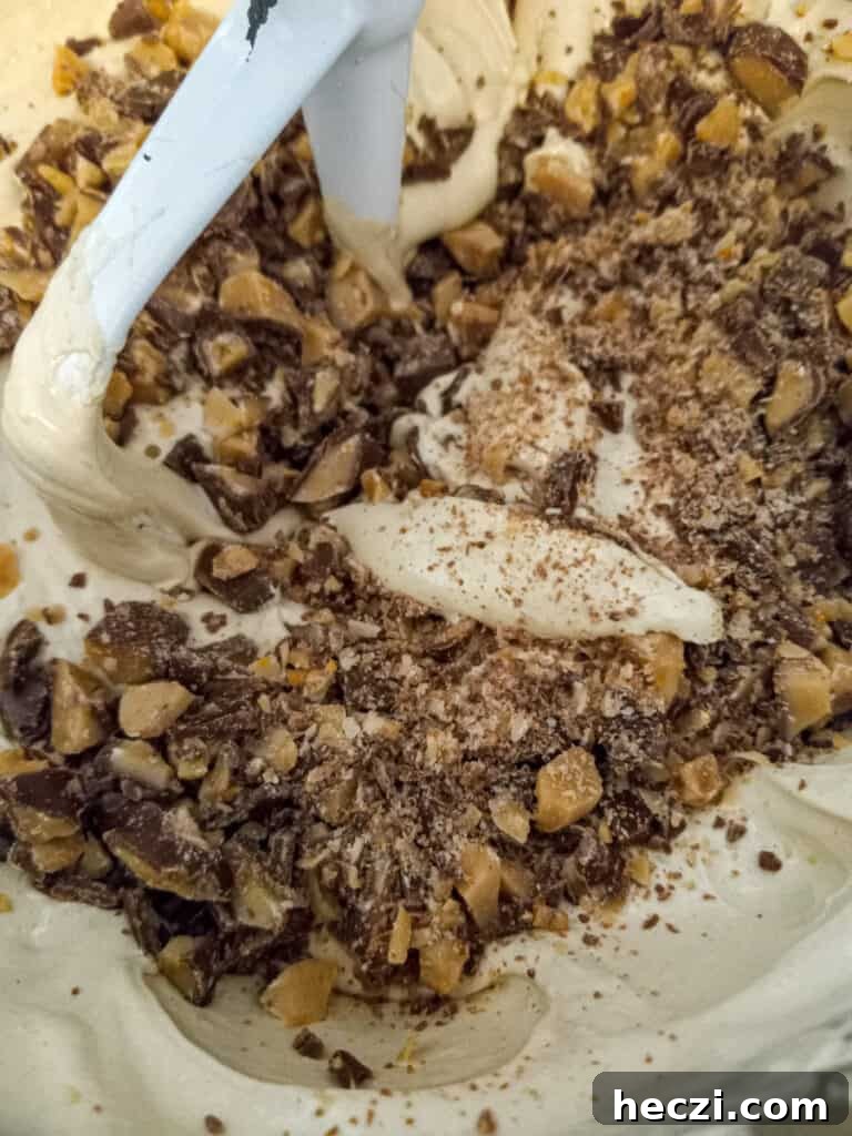 Tiramisu Torte: Layered Coffee Mascarpone Cake Recipe 4 mixing cake batter and adding the chopped Heath candy.