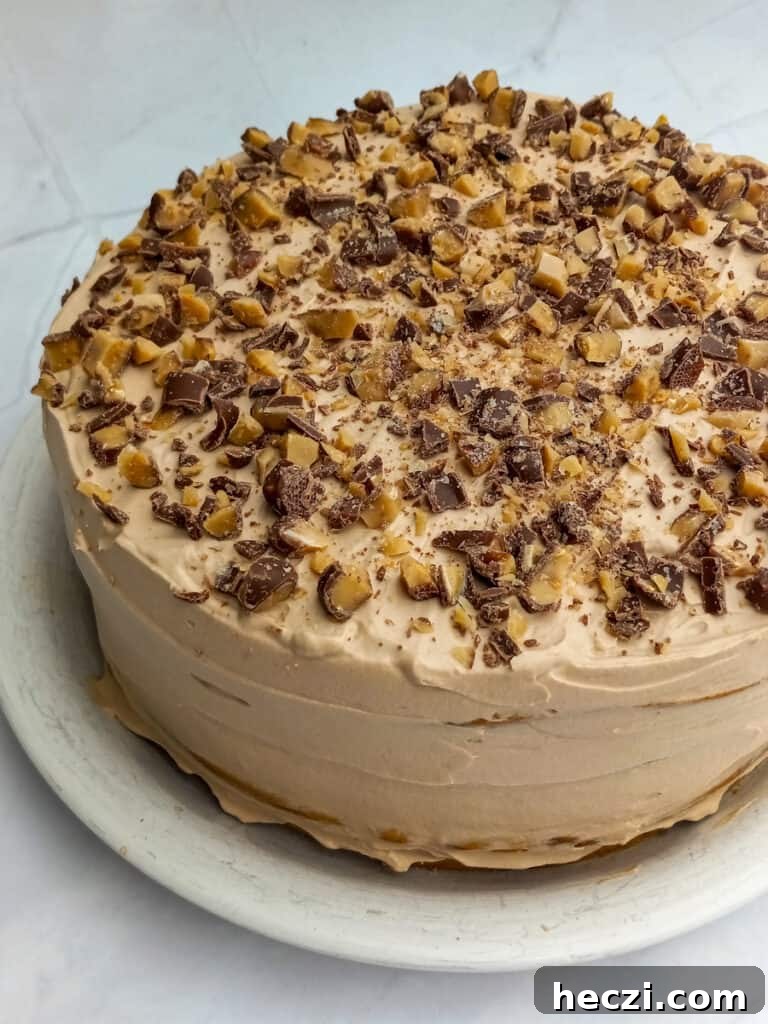 Tiramisu Torte: Layered Coffee Mascarpone Cake Recipe 8 Tiramisu Toffee Torte layered cake with mascarpone and chocolate frosting, topped with Heath candy crumbles.