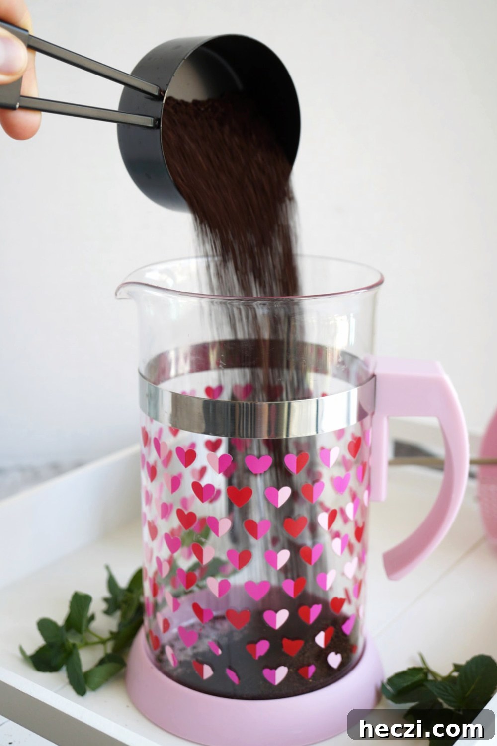 French Press Cold Brew Coffee: Smooth, Strong Cold Brew Recipe 4 pouring ground coffee into french press