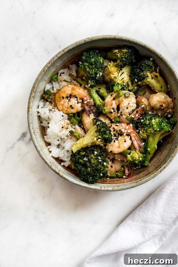 Garlic Shrimp and Broccoli Rice Bowls for Quick Weeknight Meals 5 bowl of easy shrimp and broccoli recipe over rice