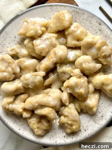 overhead shot of coconut chicken on plate
