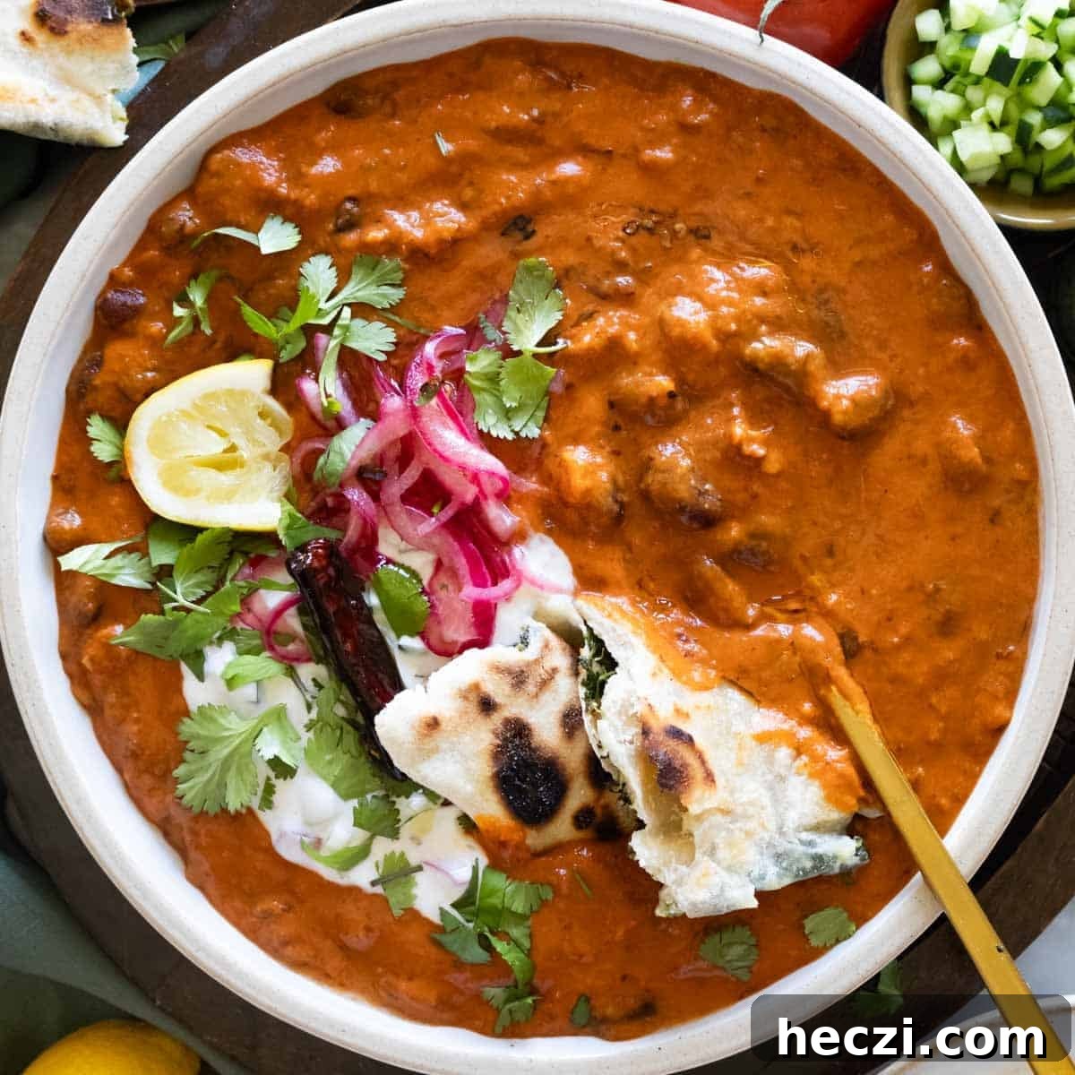 19 Budget-Friendly Bean Recipes to Save You Money Weekly 17 Rajma with a spoon.