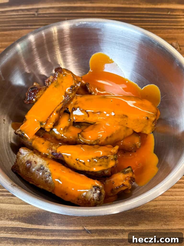 Pork spare ribs covered in buffalo sauce 