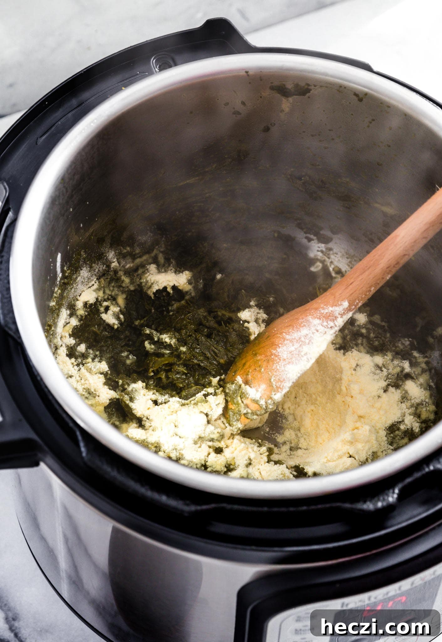 Sauteing corn flour to make Instant Pot Sarson Ka Saag