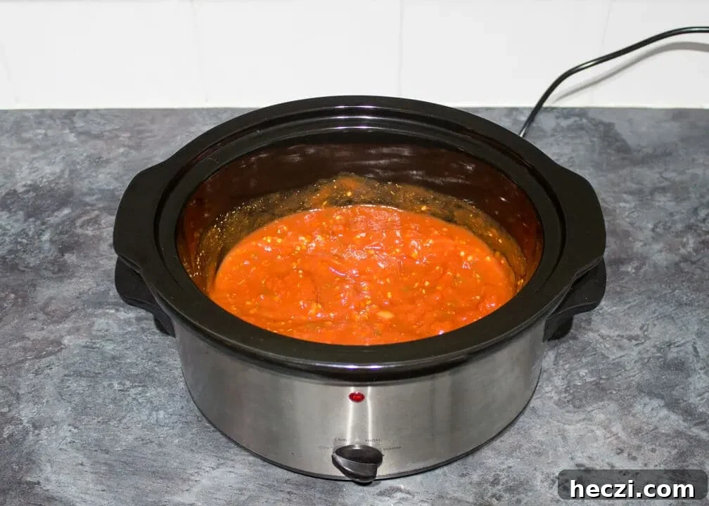 Meatballs sauce in a slow cooker.