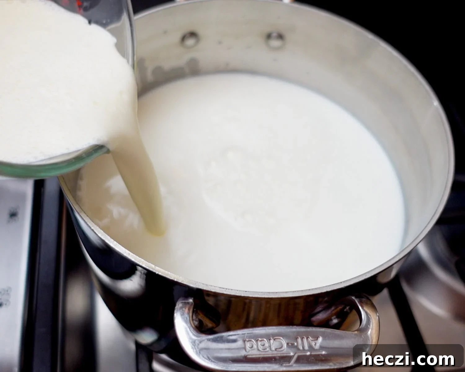 Quick Homemade Ricotta Cheese in Under 30 Minutes 11 Add heavy cream to a large pot with the milk.