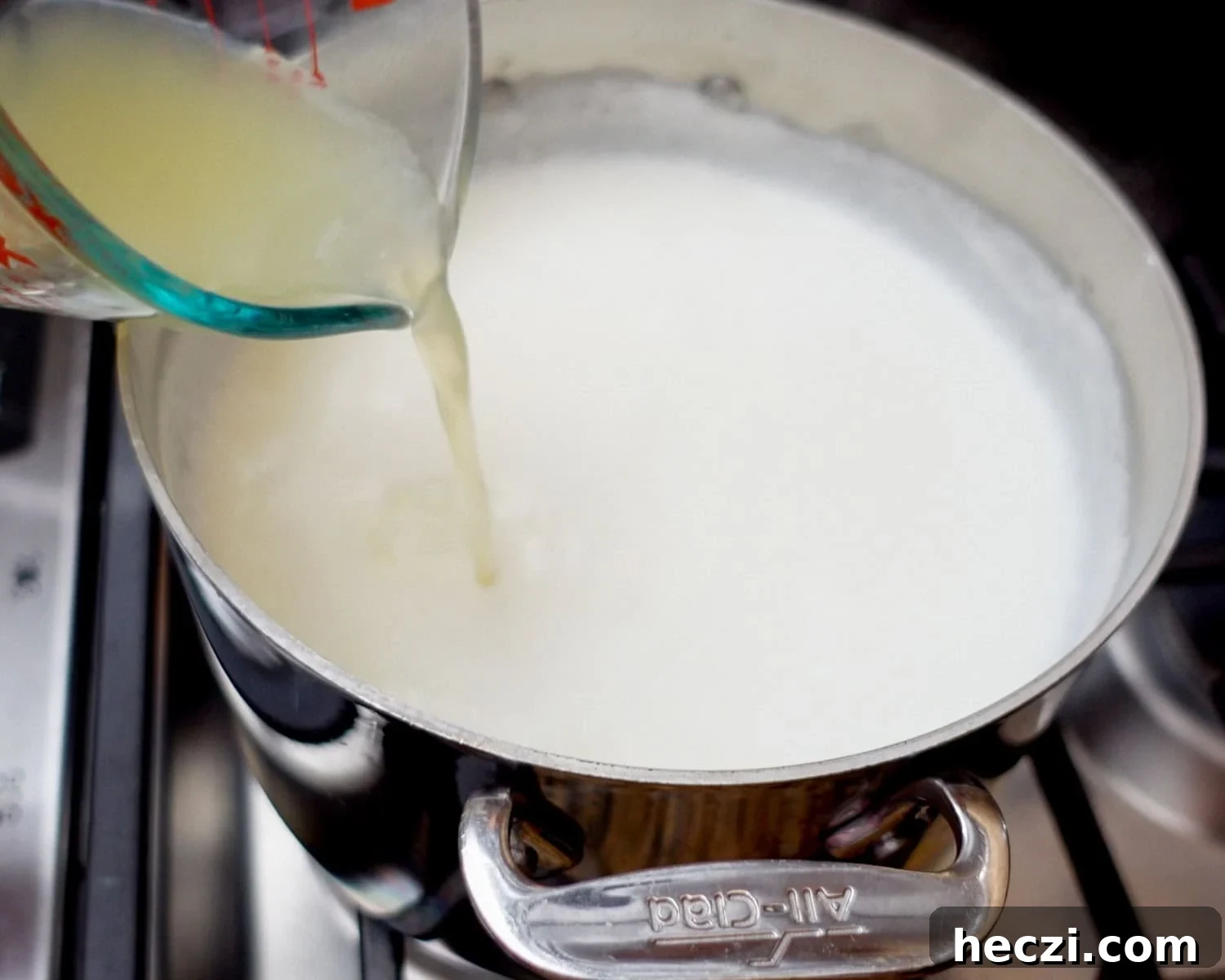 Quick Homemade Ricotta Cheese in Under 30 Minutes 14 Pour freshly squeezed lemon juice into the boiling milk mixture.