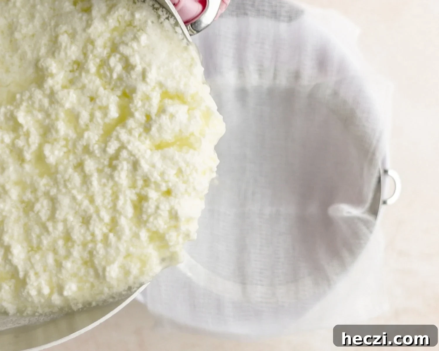 Quick Homemade Ricotta Cheese in Under 30 Minutes 16 Pour ricotta mixture into prepared sieve to separate the liquid from the solids.