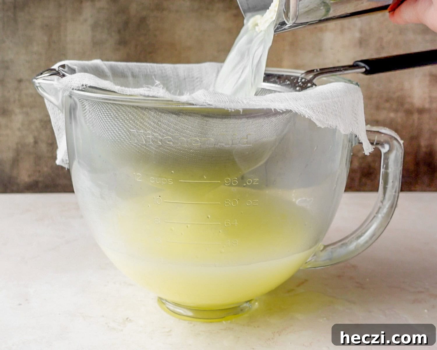 Quick Homemade Ricotta Cheese in Under 30 Minutes 21 Use a deep bowl to strain the ricotta. A stand mixer bowl works well.