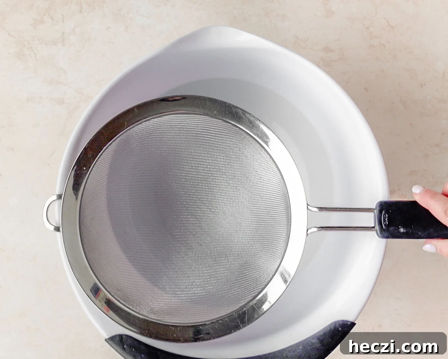 Quick Homemade Ricotta Cheese in Under 30 Minutes 6 Place a sieve over a deep bowl.
