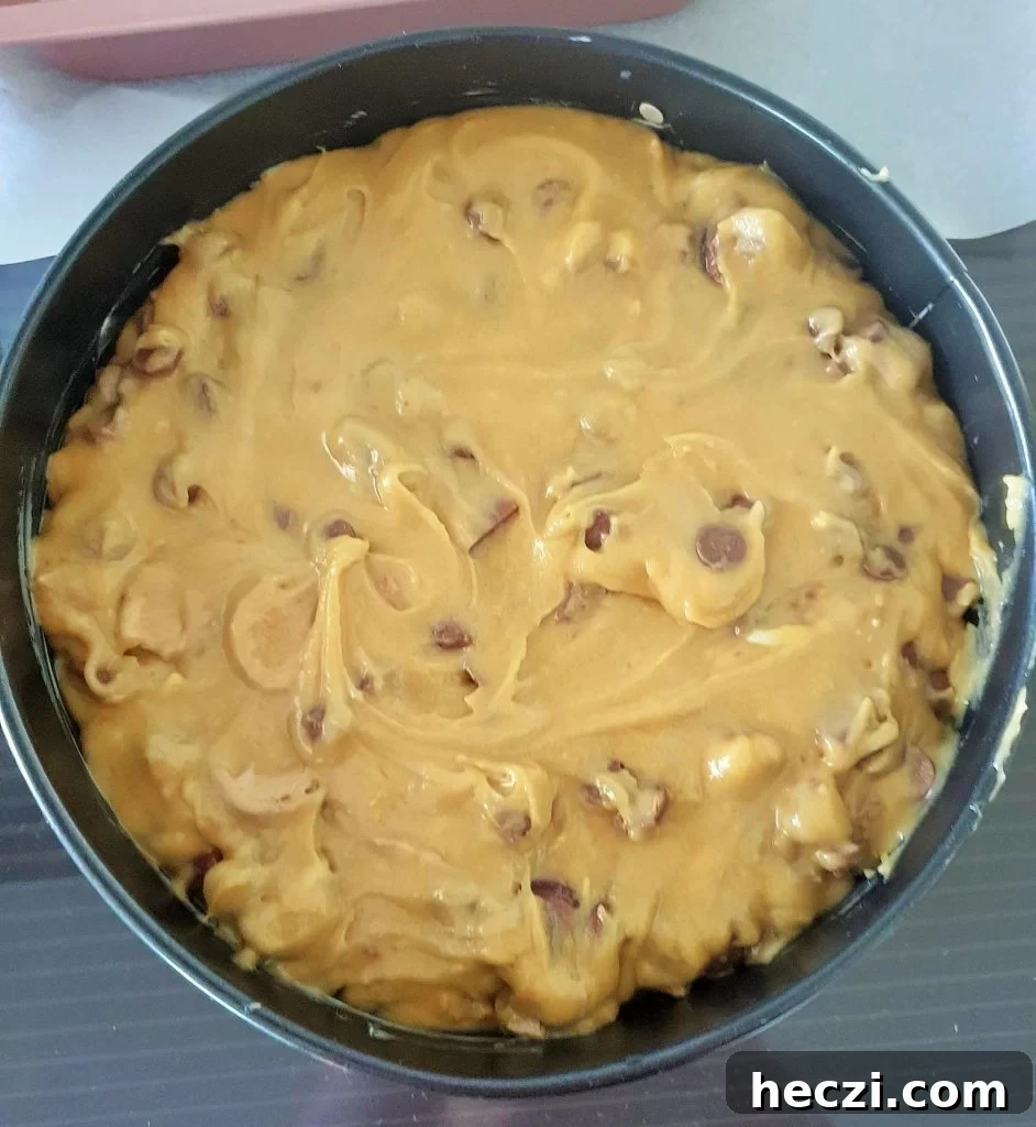 Kinder Bueno Cookie Pie Recipe — Hazelnut Chocolate Dessert Pie 9 Cookie pie in a baking pan.