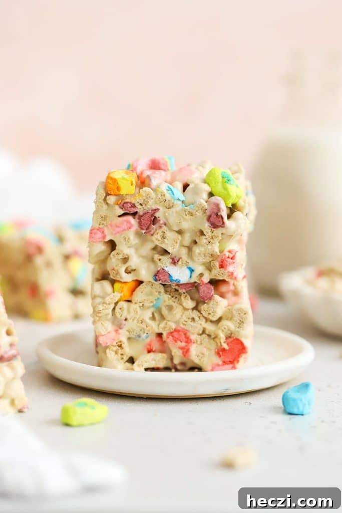 Lucky charms treats stacked on a white plate