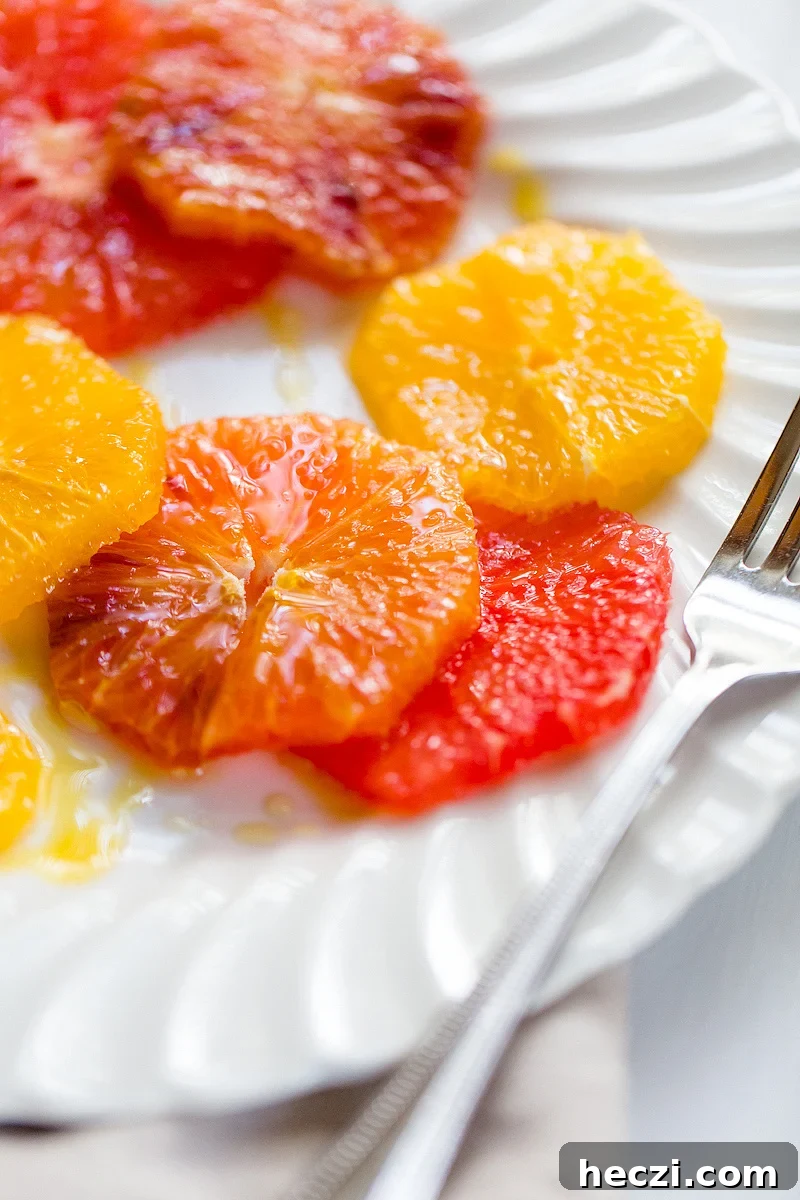 winter citrus salad up close with olive oil and honey