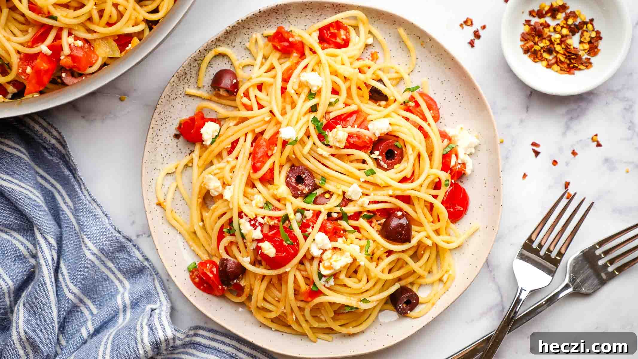 overhead view of a plate of greek spaghetti