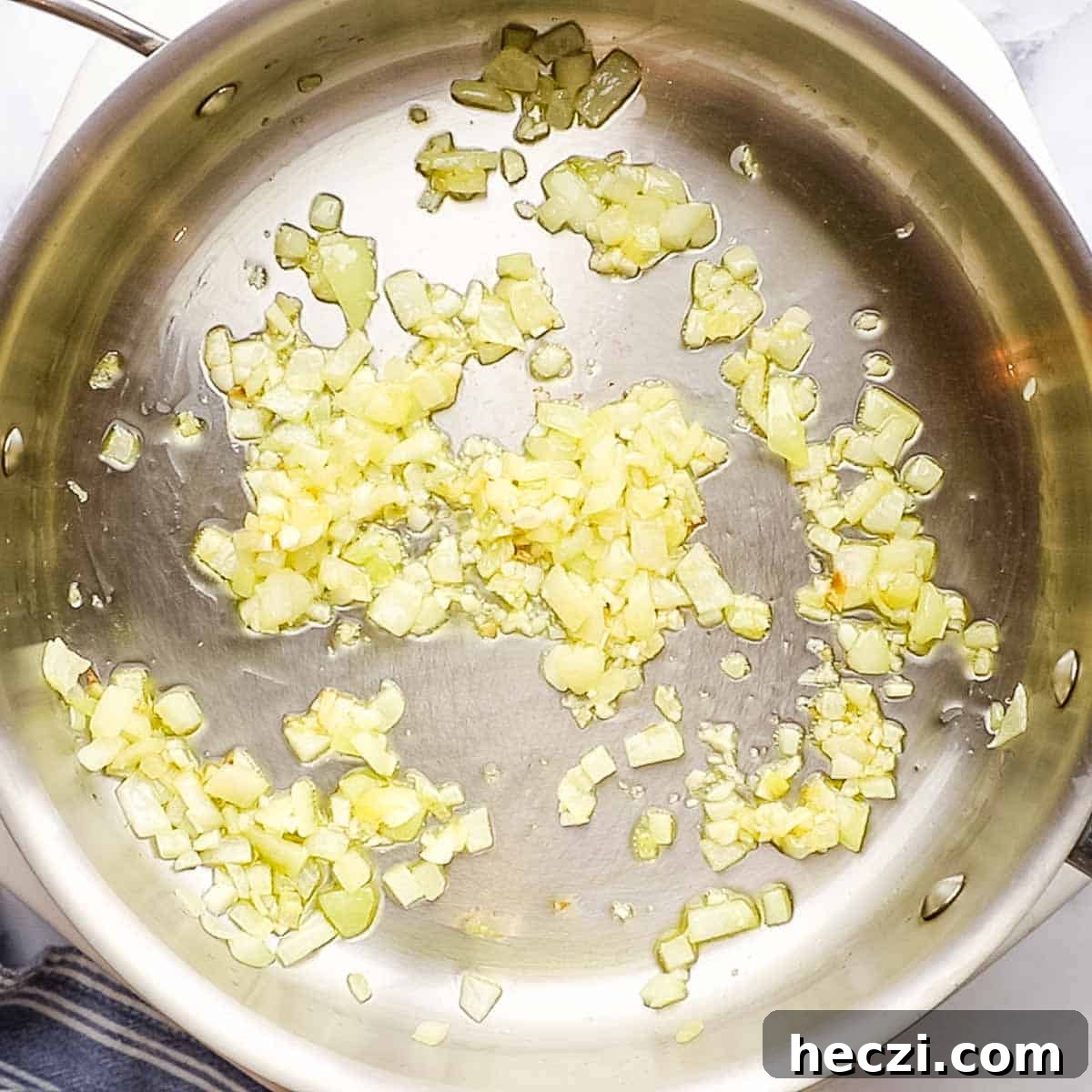 cooking onion and garlic in olive oil in a large pan