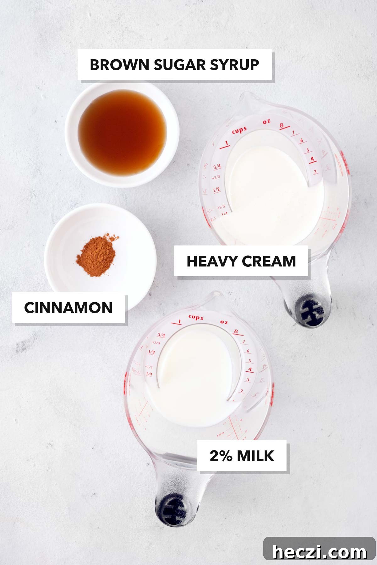 Brown Sugar Cold Foam ingredients measured in cups and bowls on a table.