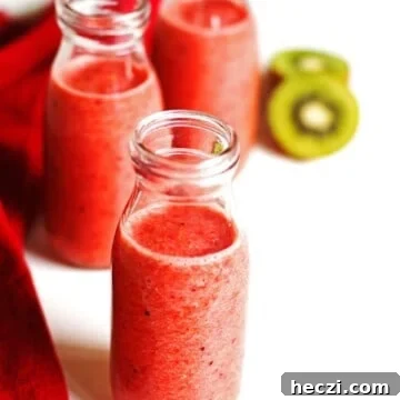 Refreshing Fruit Smoothie Recipes for Energy and Flavor 8 Smoothie in three glasses with sliced kiwi and a red napkin next the the glasses
