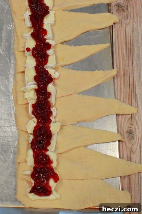 Cranberry Brie Crescent Ring — Holiday Appetizer Recipe 4 Cranberry Brie Crescent Bake is fun and easy to make using only three ingredients.