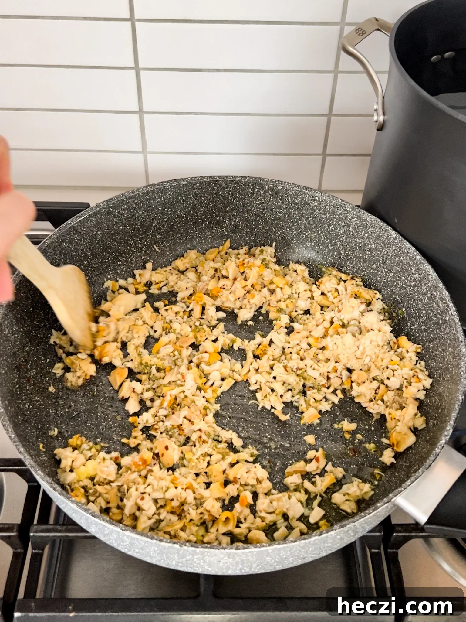 Red Clam Sauce Recipe for Pasta: Simple Italian-Style Sauce 6 A pan with clams sautéing in it.