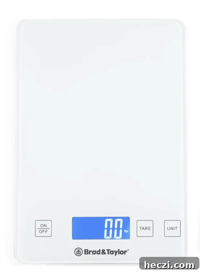 Top Gifts for Sourdough Bakers: 30+ Ideas They'll Love 6 Digital kitchen scale used for measuring sourdough ingredients by weight.