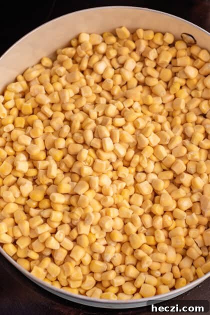 Add corn to skillet.