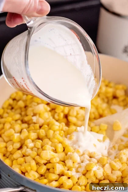 Add cream to skillet.