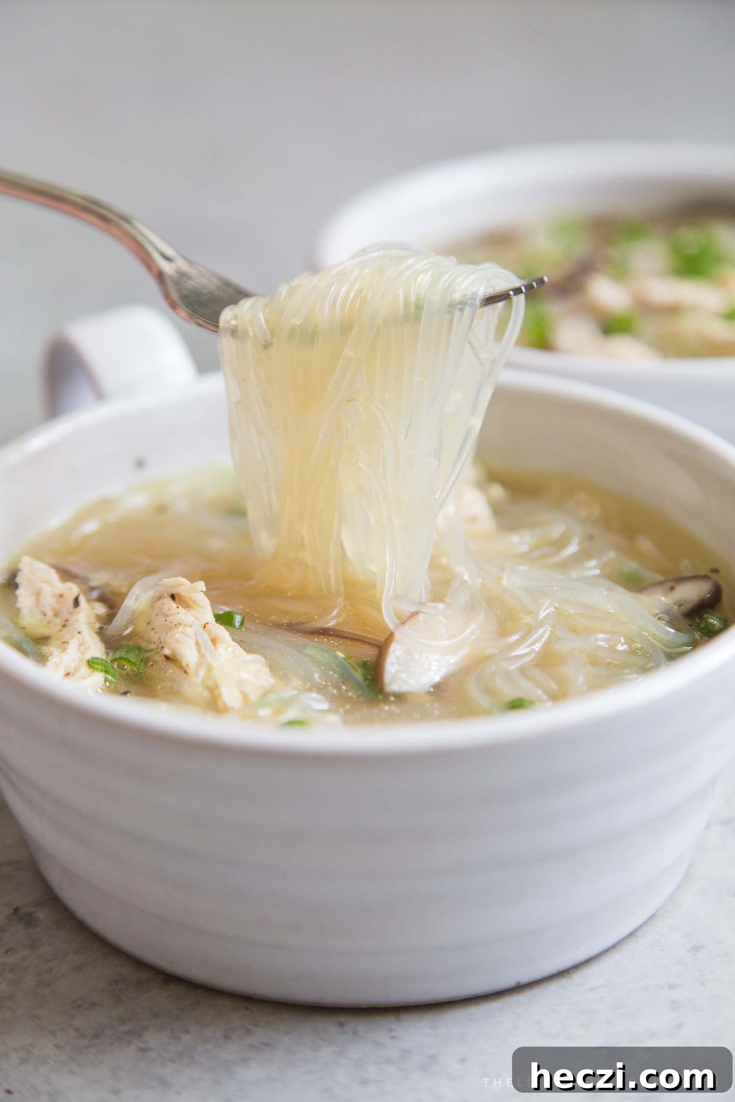 Filipino Chicken Sotanghon Noodle Soup Recipe 4 mung bean thread noodles pulled out of chicken sotanghon soup.