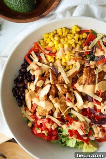 Southwest Chicken Salad in bowl with dressing.