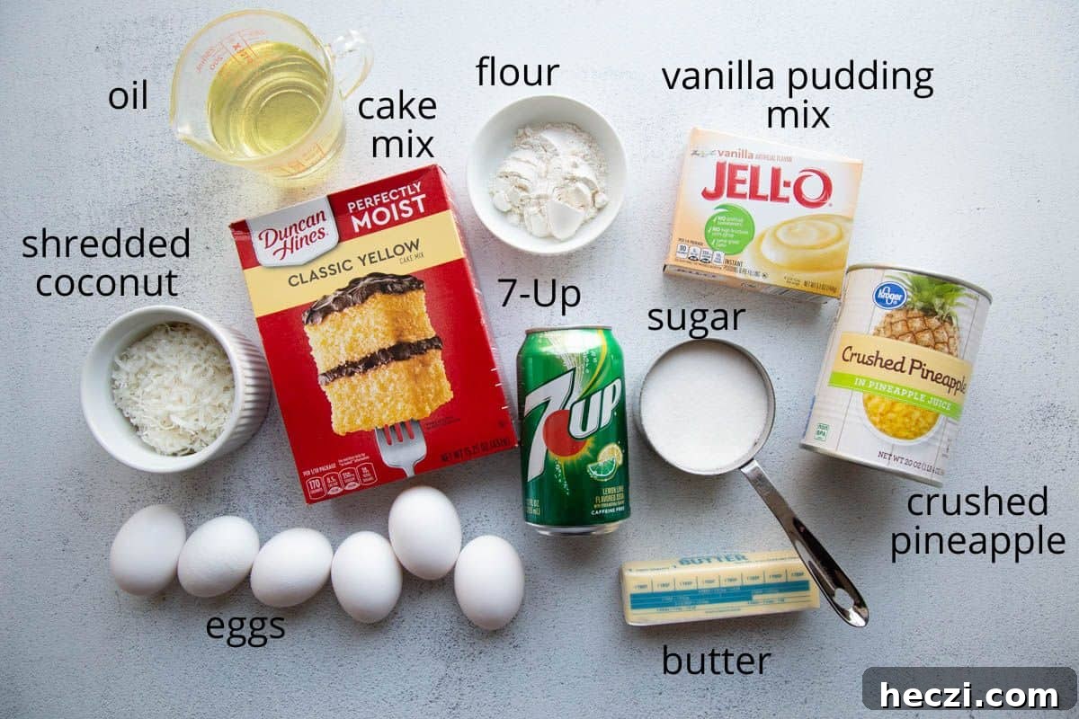 7up, cake mix, eggs, butter, and other cake ingredients on a white table.