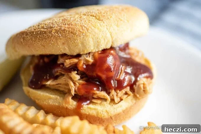 Crock Pot Pulled Chicken Recipe for Tender, Juicy Sandwiches 4 Crockpot Pulled Chicken Sandwich