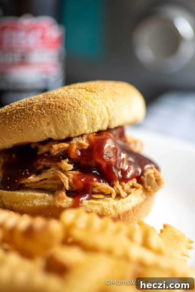Crock Pot Pulled Chicken Recipe for Tender, Juicy Sandwiches 8 Crock Pot BBQ Pulled Chicken Sandwich