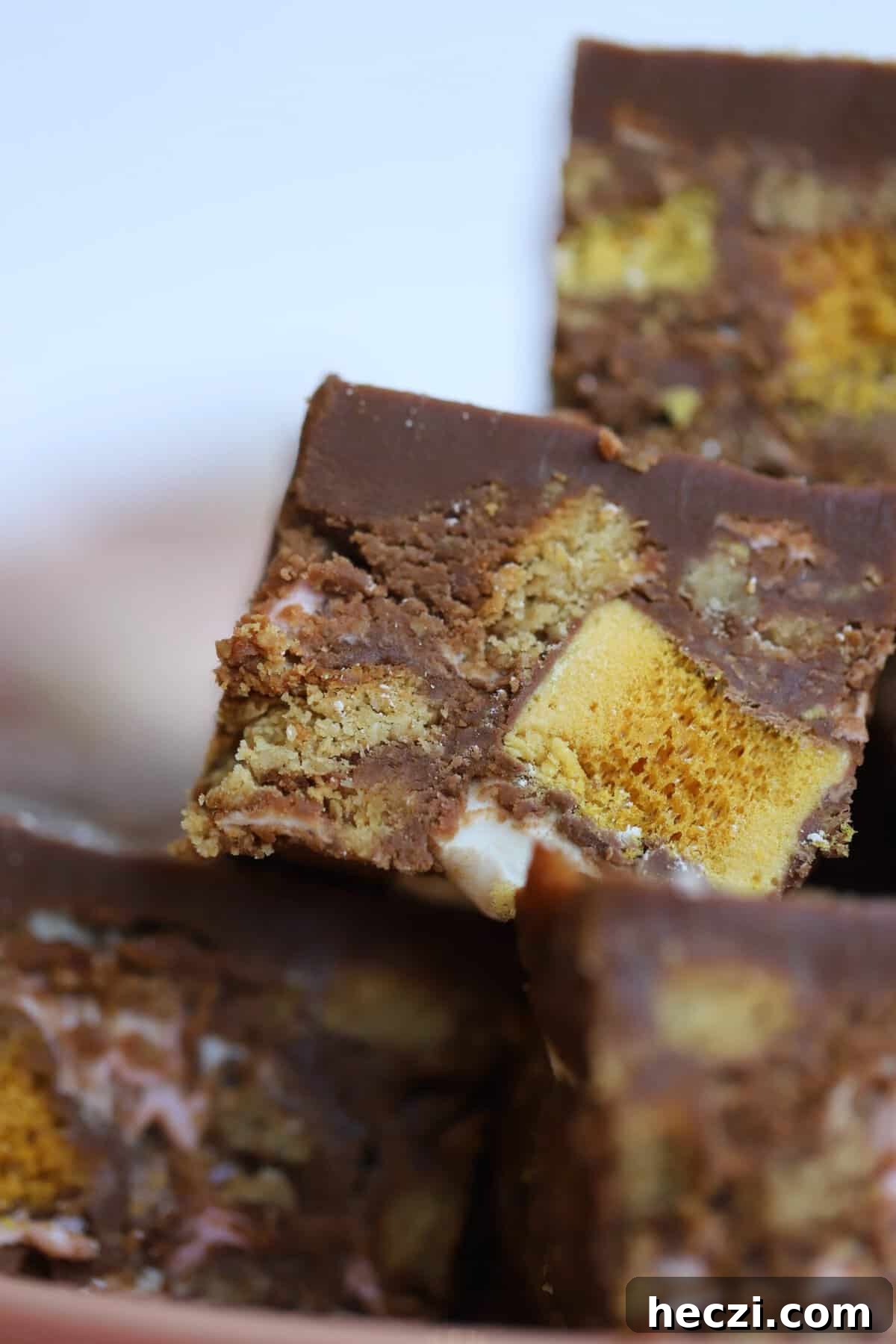 Gluten-Free Rocky Road Brownies Recipe 6 Close up of a rocky road with Crunchie bars.