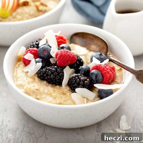 Creamy Instant Pot Steel-Cut Oats Recipe for Busy Mornings 11 Bowl of steel cut oats breakfast cereal topped with berries