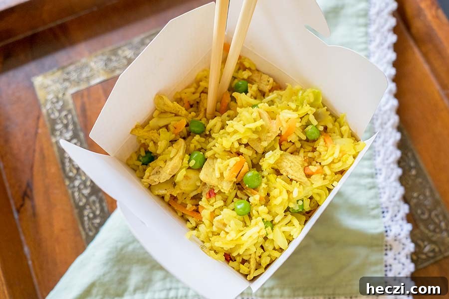 Creative Gluten-Free Recipes for Holiday Leftovers 11 curry pork fried rice in a take out container