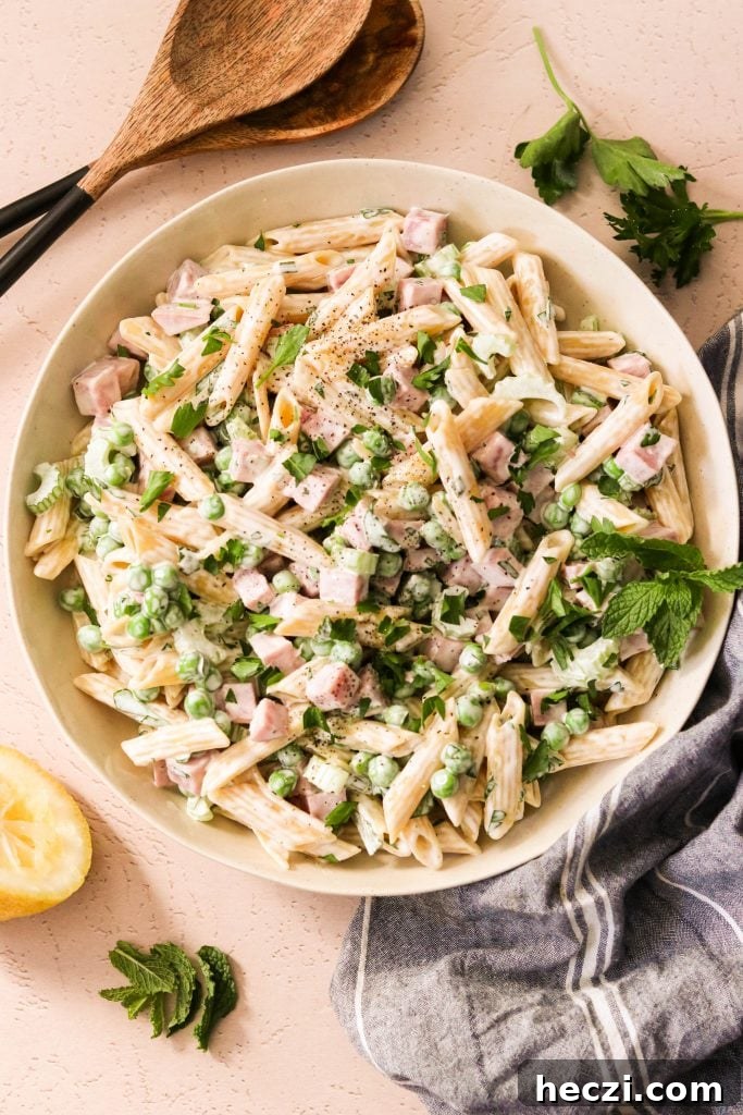 ham and pea pasta salad in a bowl