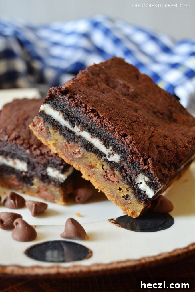 Decadent Homemade Slutty Brownies Recipe 3 a square of slutty brownies on a polka dot plate