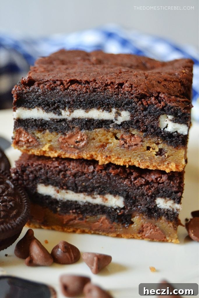 Decadent Homemade Slutty Brownies Recipe 5 a closeup double stack of slutty brownies on a white plate