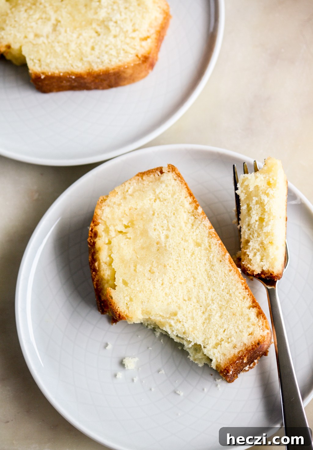 Soft lemon scented butter cake with a tart lemon syrup poured on top