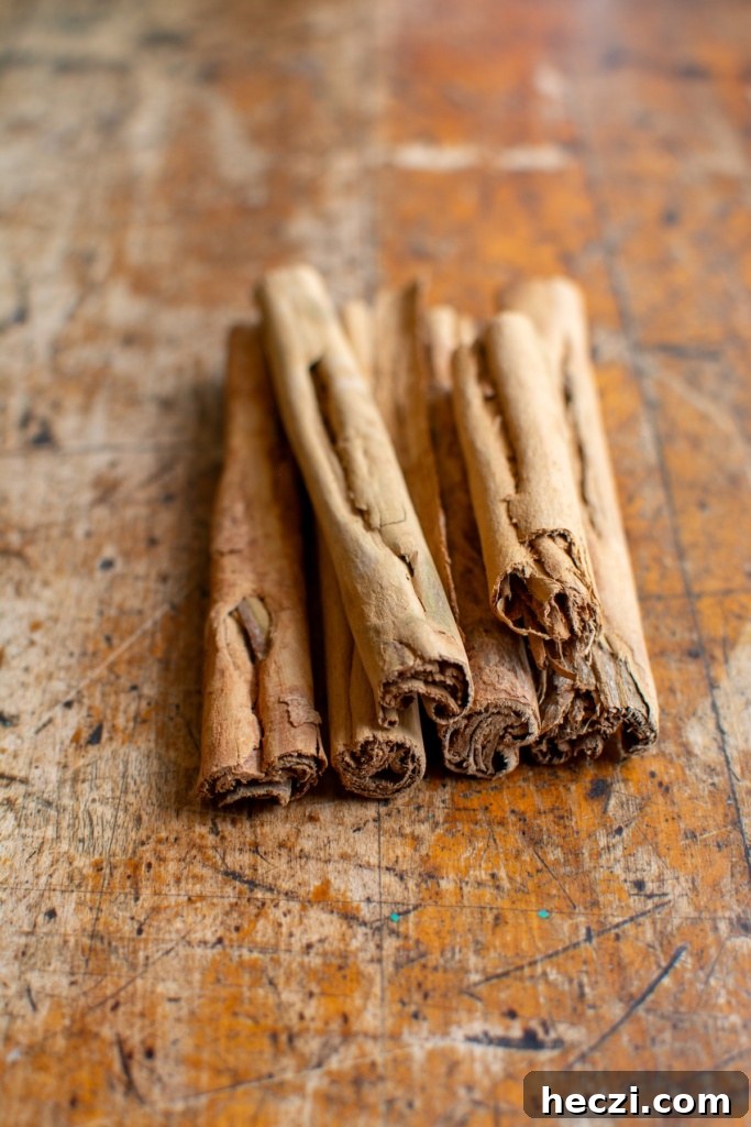Mexican Cinnamon Ice Cream Recipe — Creamy Horchata-Style Ice Cream 4 Several sticks of Ceylon cinnamon on a wood table